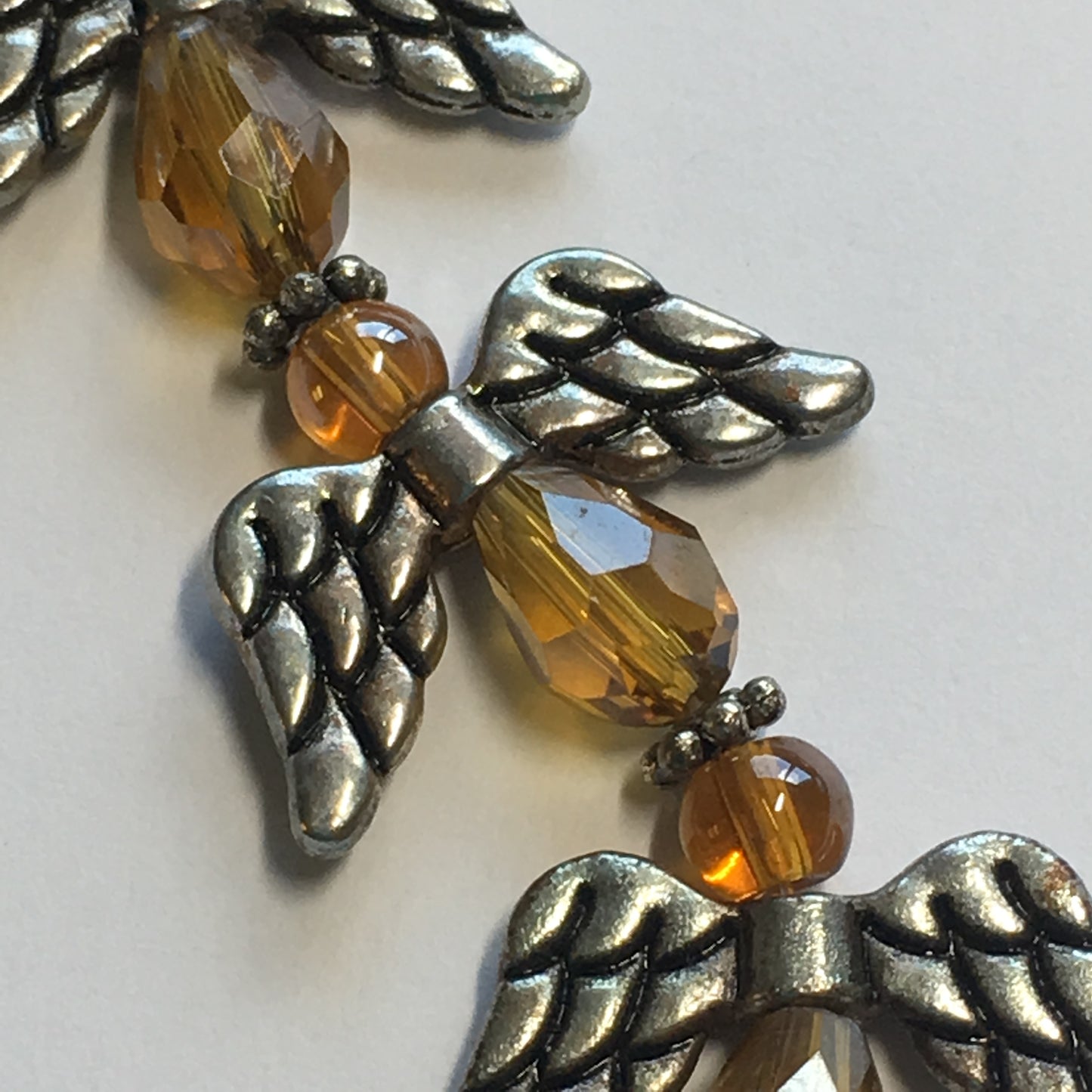 Bead Gallery Amber Brown Glass Faceted Drop Beads with Antique Silver Wings Beads, 7 of Each Bead