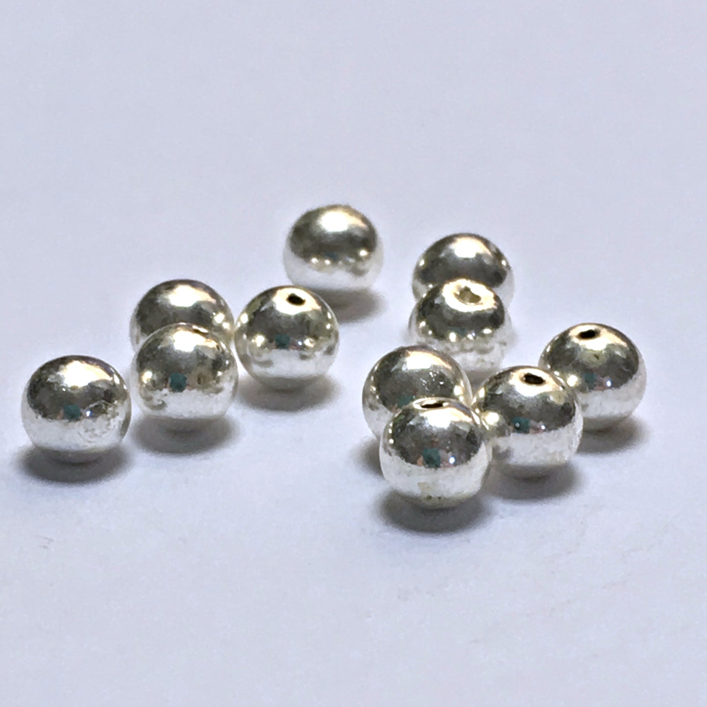 Beadalon Perles rondes plaquées argent, 4 mm - 11 perles