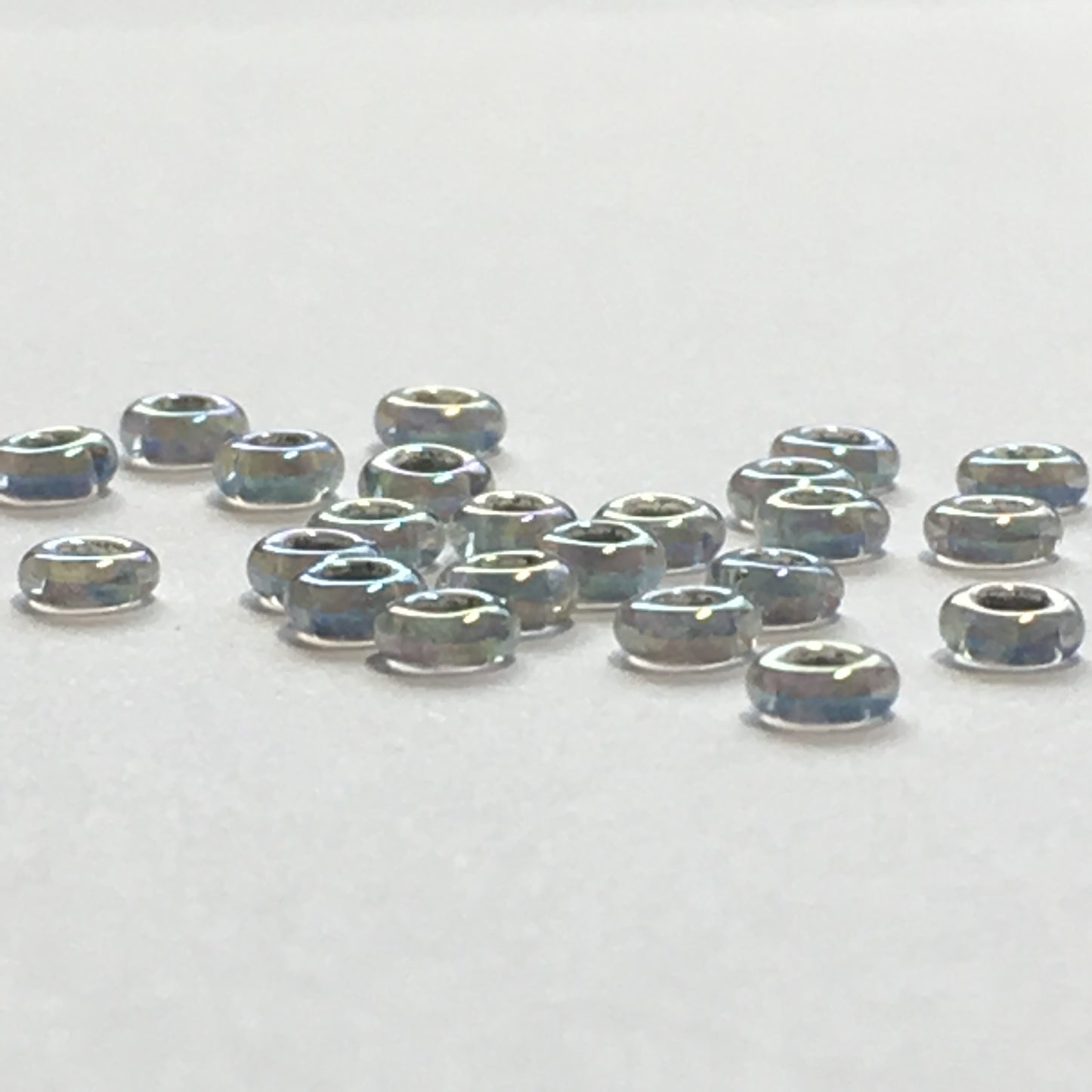 TOHO TD-8-261 - 8/0  Metallic Grey Lined Crystal Rainbow Demi Beads, 5 gm