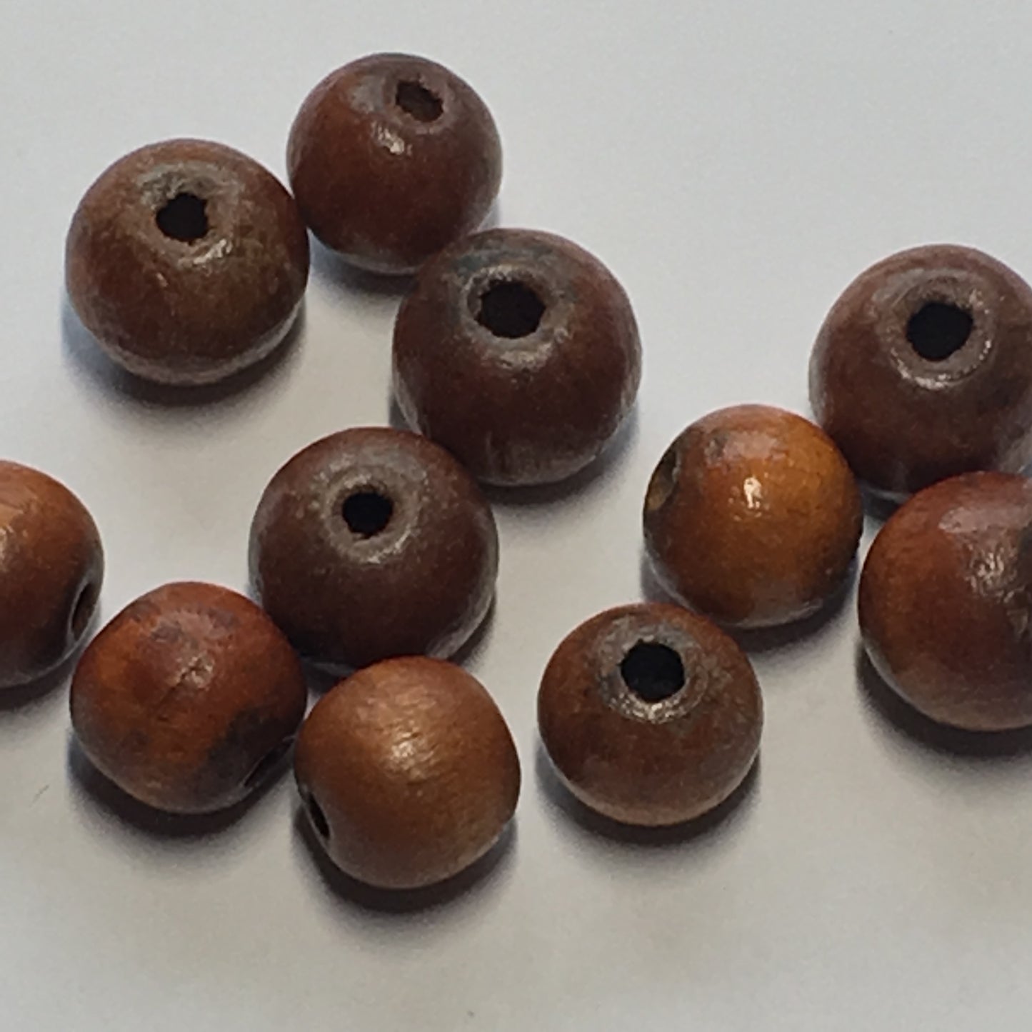Brown Round Wooden Beads, 10 and 12 mm - 11 Beads