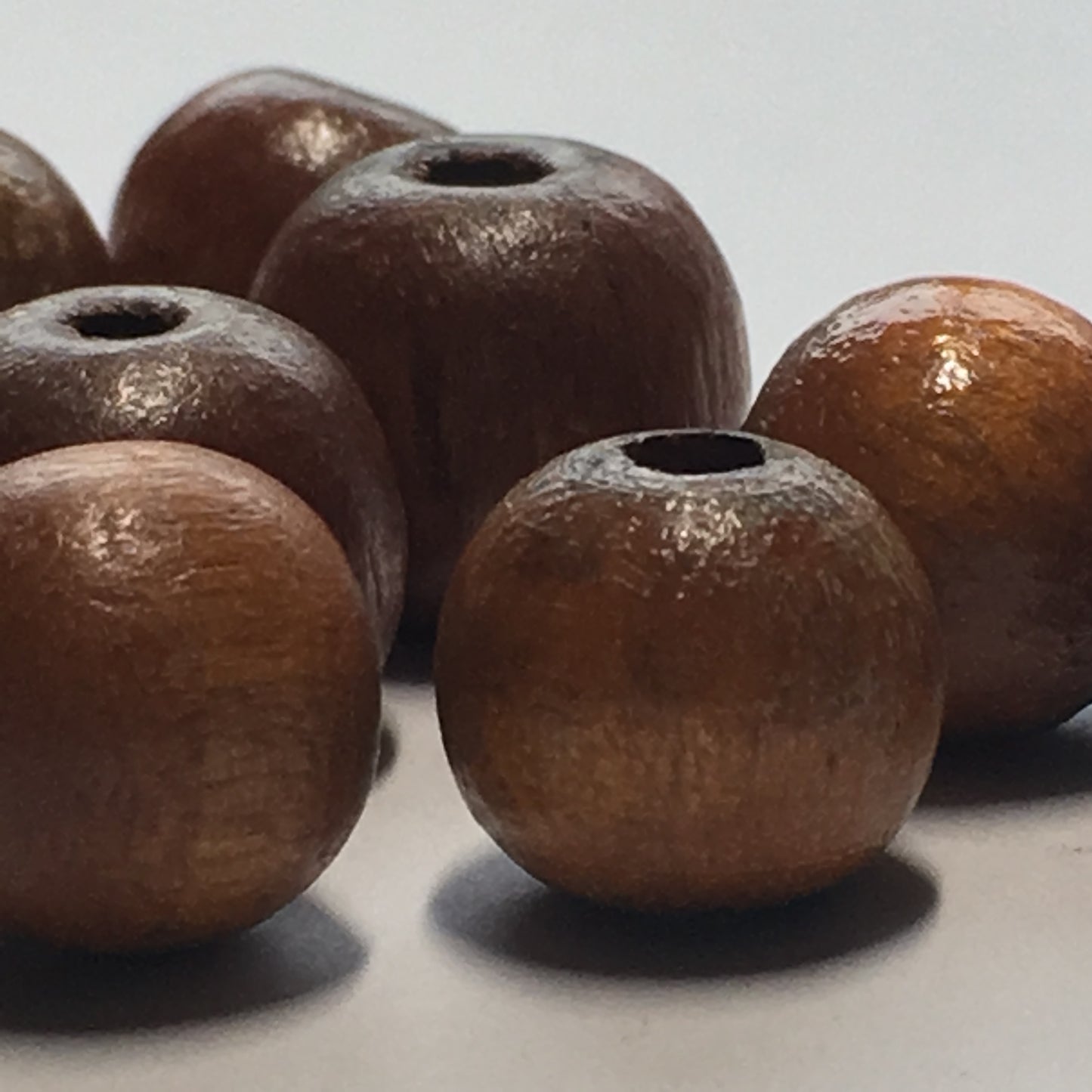 Brown Round Wooden Beads, 10 and 12 mm - 11 Beads
