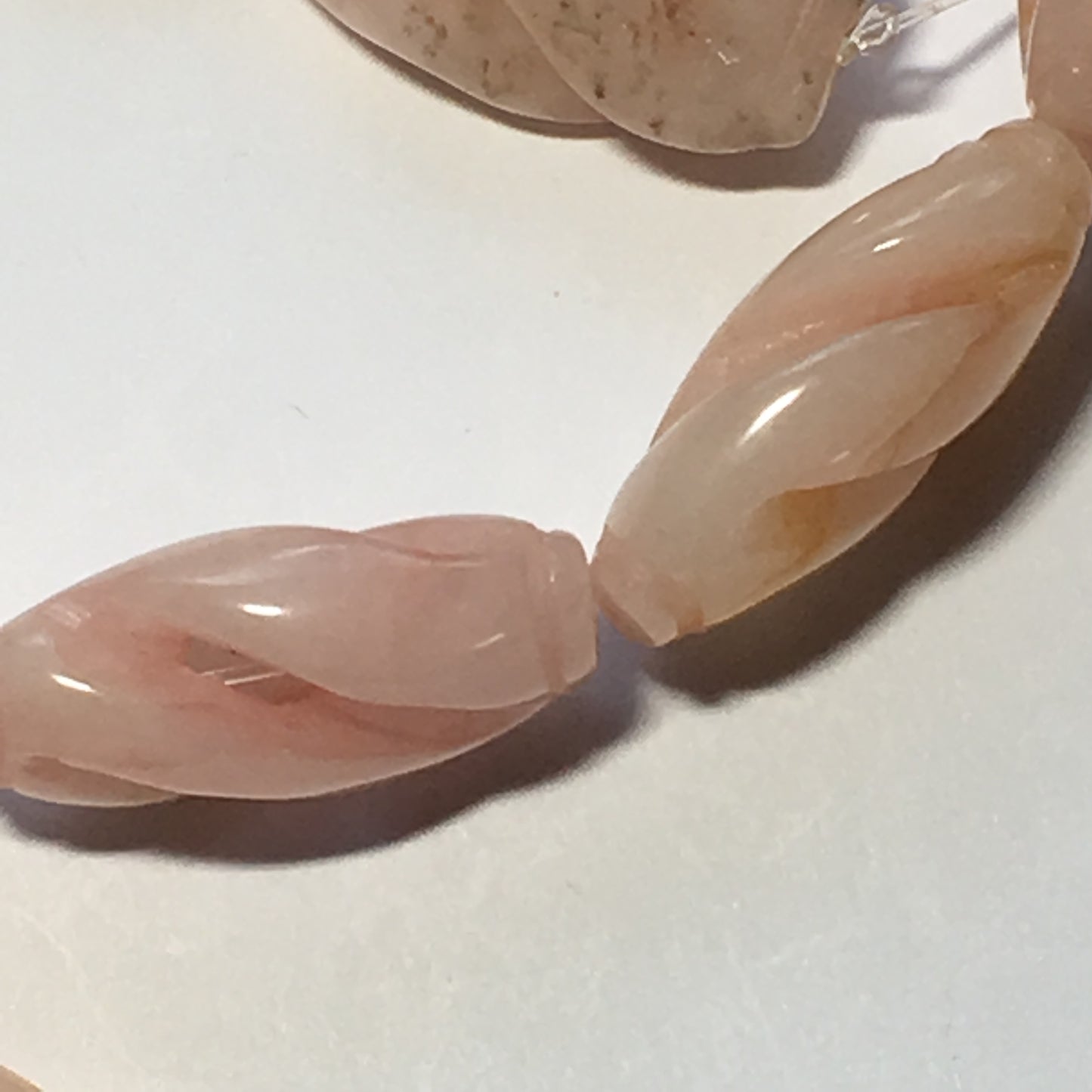 Bead Gallery Carved Peach Jade Semi-Precious Stone Oval Beads, 25 x 15 mm - 16 Beads