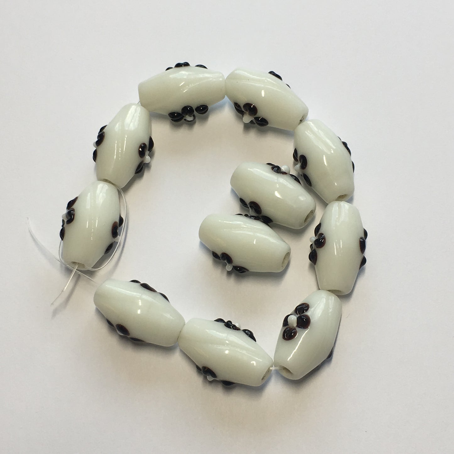 White Oval Lampwork Glass Beads with Brown/Black Flowers, 20 x 10 mm - 11 or 12 Beads