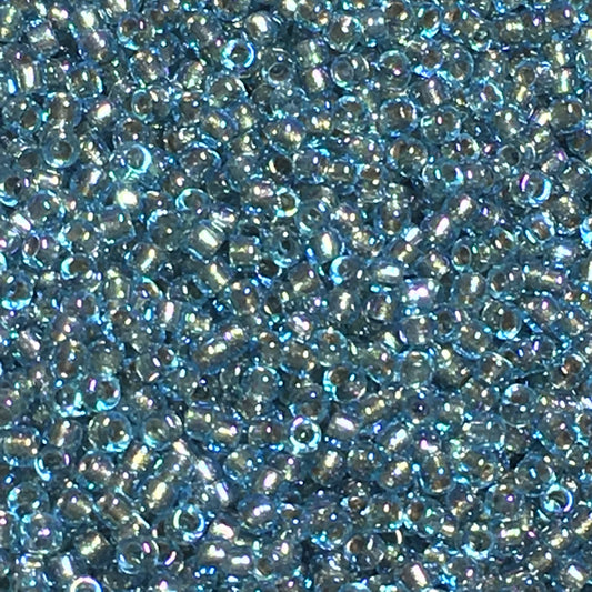 TOHO TR-15-995  Bronze Lined Aqua Rainbow Seed Beads, 5 gm